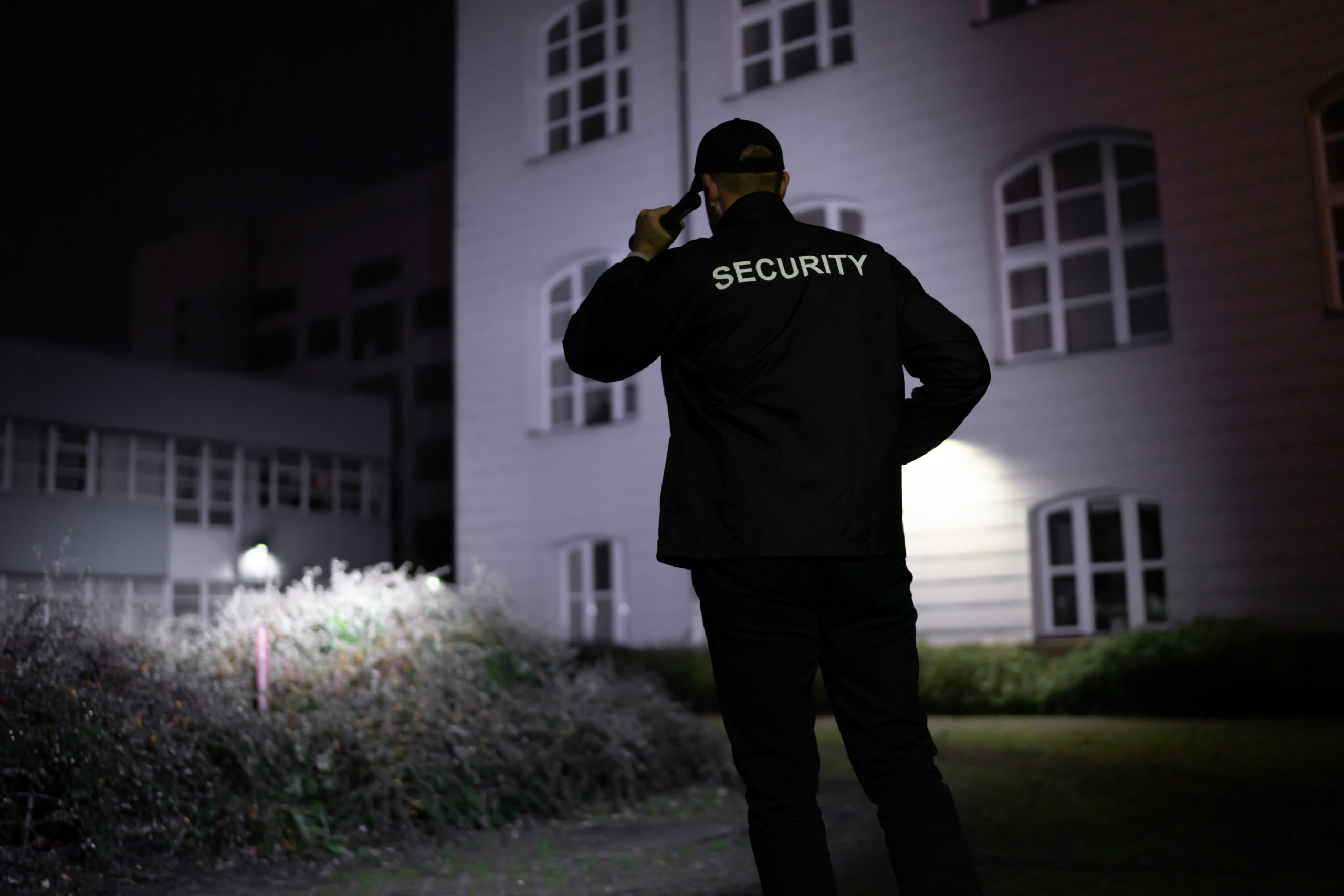 Security Guard Walking Building Perimeter